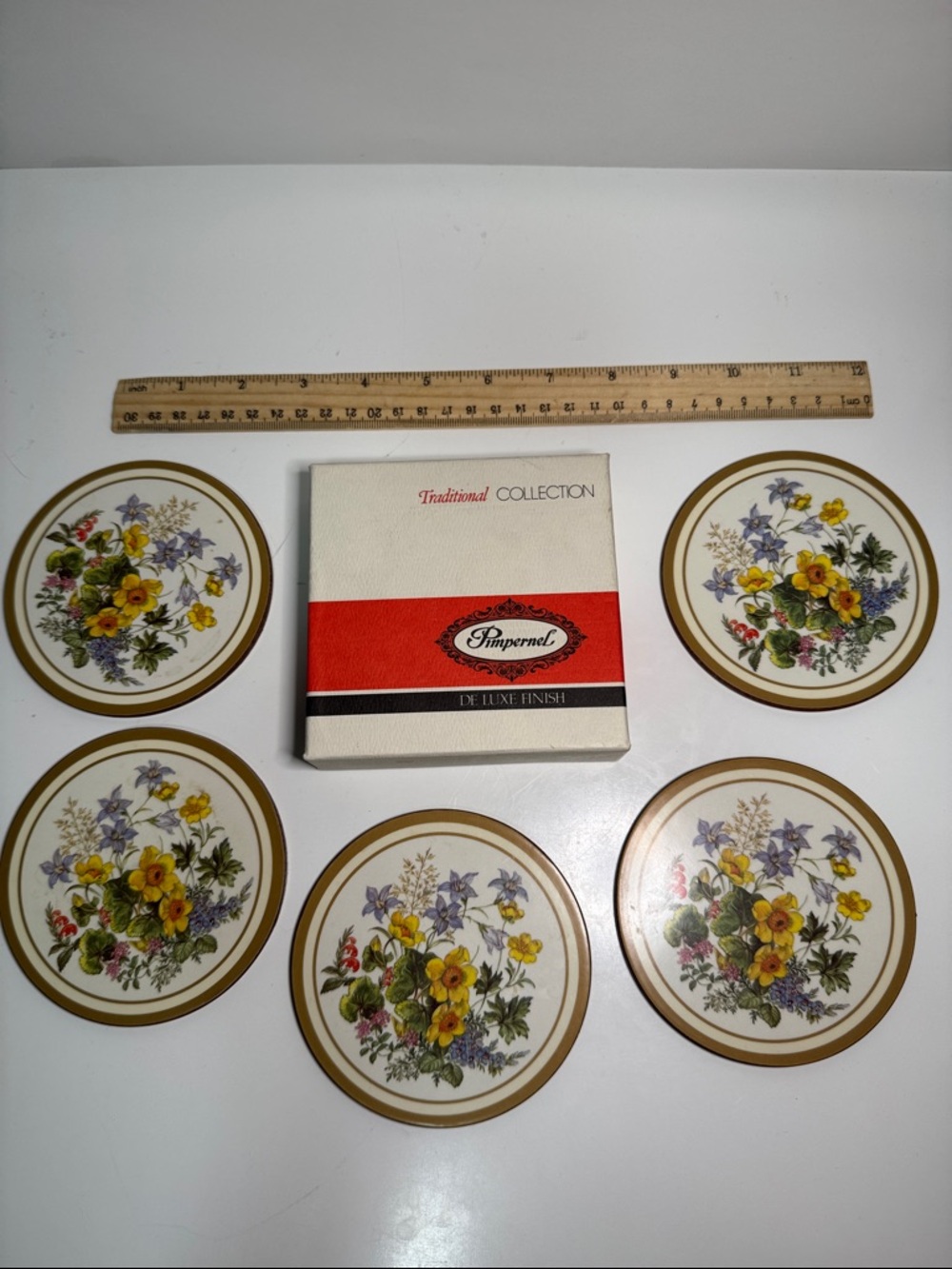 NIB 5 round Pimpernel Floral Coaster Set in Yellow, Purple & Cream England